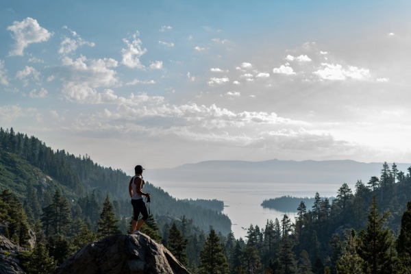 hiker overlooking lake tahoe